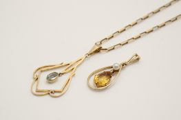A 9ct gold chain and two stone set pendants. The link necklace, weight 4.