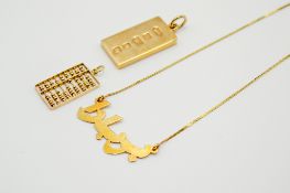 Three gold and yellow metal pendants and necklace. Including a hallmarked 9ct gold ingot, weight 15.
