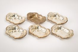 A set of six small American William B Kerr sterling silver dishes.