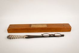 A pair of Victorian silver handled tortoiseshell lorgnette spectacles.