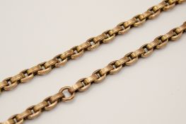 A yellow metal Albert chain.