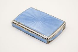 A small silver and blue enamel box.
