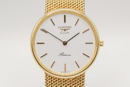A 9ct gold Longines Presence quartz wristwatch.