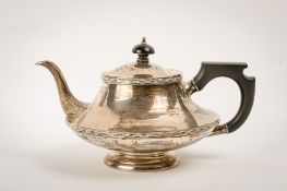 An early 20th century silver teapot.