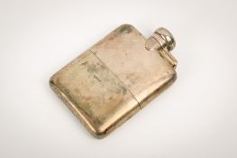An early 20th century silver hip flask.