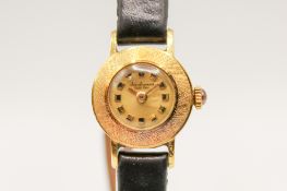 An 18ct gold lady's Jules Jurgensen wristwatch.