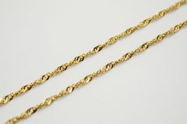 A 9ct gold twisted curb link chain necklace.