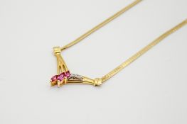 A 14ct gold and ruby necklace.