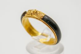 A 19th century gold and tortoiseshell mourning ring.