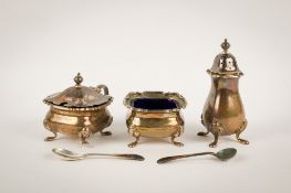 A mid-century three piece silver cruet set.