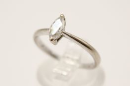A white metal diamond solitaire ring.