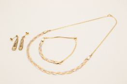 A matching 14ct gold necklace and bracelet and matched 9ct gold earrings.