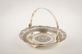 An Armenian white metal basket dish.