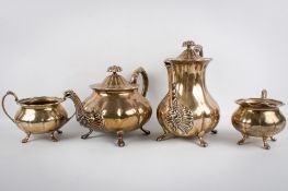 An Elizabeth II silver four-piece tea service.