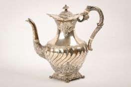 An early 20th century Walker & Hall silver coffee pot.
