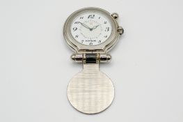 A Montblanc pocket travel alarm clock.