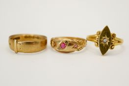 Three 18ct gold and stone set rings.