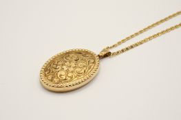 A 14ct gold chain necklace and a 9ct gold pendant locket.
