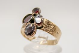 A 19th century yellow metal and stone ring.