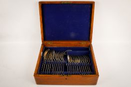 An early 20th century part canteen of silver cutlery.