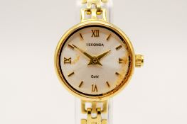 A Sekonda lady's 9ct gold watch. The chrome dial with baton and Roman numerals, case diameter 2.