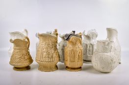 Nine assorted 19th Century English pottery pitchers. All with moulded decoration.
