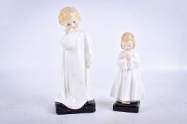 Two Royal Doulton figures of children. Comprising 'Darling' HN 1319 and 'Bedtime' HN 1978. Max.