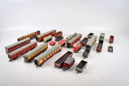 A collection of 00 gauge carriages, freight and rolling stock.