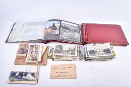 A collection of postcards, photographs and an autograph book, etc.