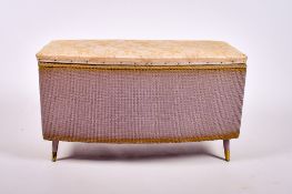 A mid-century Lloyd Loom style bow fronted blanket box.