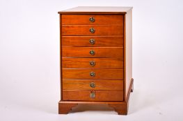 A contemporary wooden chest of drawers.