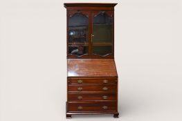 A late 19th century mahogany bureau bookcase.