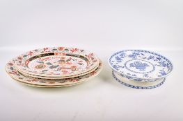 A set of four 19th century hand painted Ironstone plates and a Mintons blue and white footed dish.