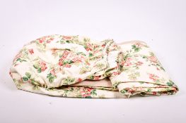 A pair of mid-century 'Wild Roses' pattern lined and pleated curtains.