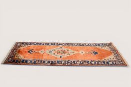 A 20th century woollen runner.