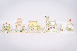 A group of five assorted Coalport china model buildings.