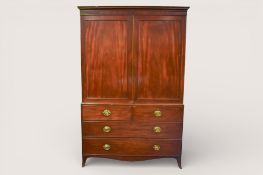 A Georgian mahogany linen press.