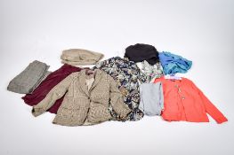 An assortment of ladies designer and high end clothing.