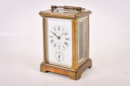A French 20th century brass and five glass carriage clock.