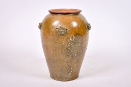 A large terracotta vase.