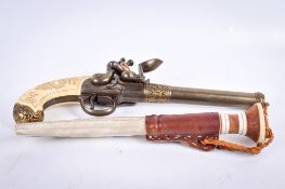 A reproduction flintlock pistol and hunting knife.