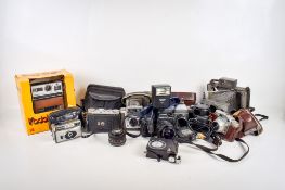 A collection of vintage film cameras. Including a Kodak EK 100 instant camera boxed, etc.