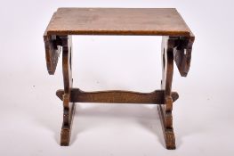 A 19th century oak small drop leaf table.