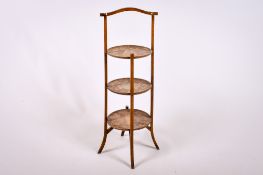 A late Victorian pokerwork decorated three-tier cake stand.