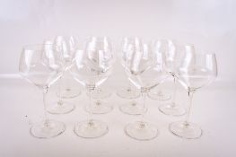 A set of twelve Riedel crystal wine glasses. H24cm, in the original box.
