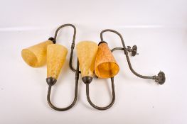 A set of four wall lights.