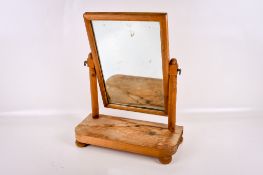 A vintage stripped pine dressing table mirror.