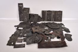 A large collection of early 20th century plaques.