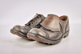 A pair of early 20th century men's brown leather hob nail shoes, size 9.5.