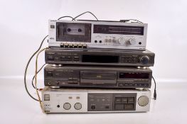 A group of five vintage items of hi-fi separates music equipment.